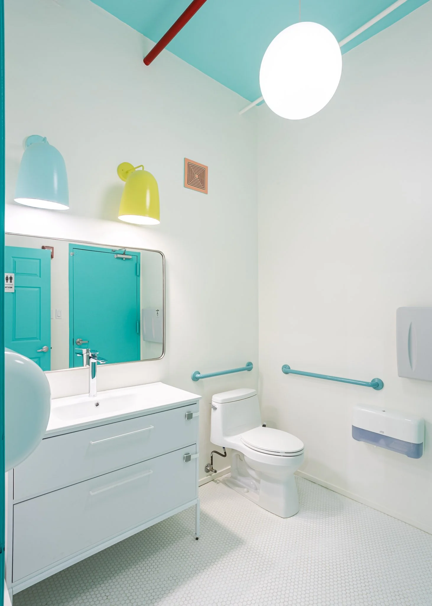 Bright finished restroom electrical work by X Electric